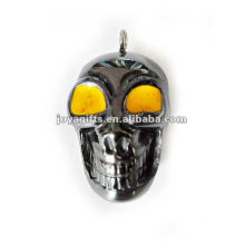 Petits pendentifs squelettes humain à l&#39;hématite avec oeil jaune